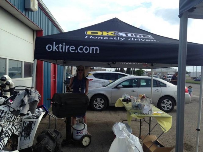 Cooking in front of Ok Tire & Auto Service